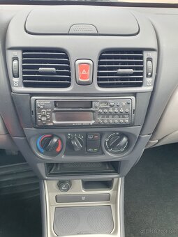Nissan Almera 1,5 - 17
