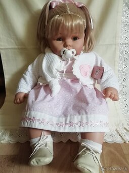 Realisticka babika s oblecenim - 18