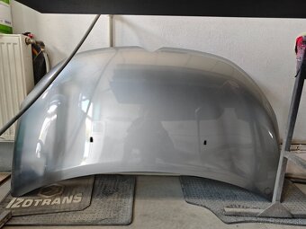 Nárazník kapota blatnik - 18