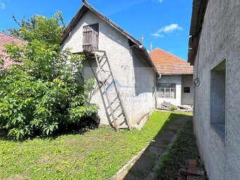 PREDAJ dom s garážou a pozem. v Oslany - 18