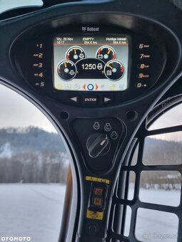 Pásový nakladač Bobcat T770 s nosnosťou 2,5 tony. Americký v - 18