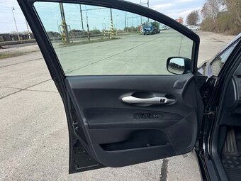 Auris Hybrid 1,8 - 18