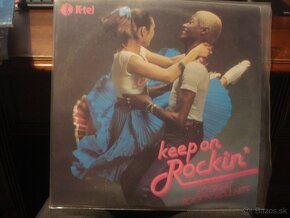 LP BOWIE COCKER B.HOLLY FOREIGNER ELO BYRDS E.JOHN MADONNA - 18