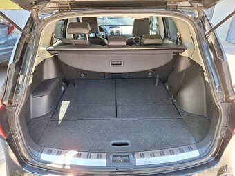 Nissan Qashqai +2 - 18