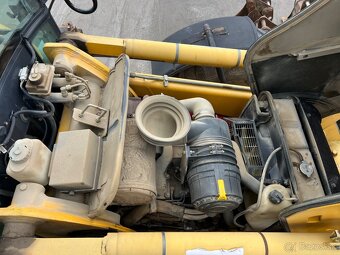 KOMATSU WB975 4X4 - 18