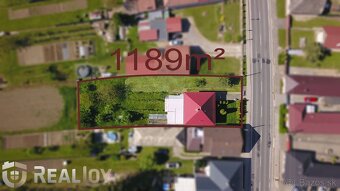 Ponúkame na predaj rodinný dom s garážou a veľkým pozemkom v - 18