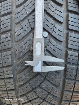 Zimne kolesa Audi E-tron 5x112 r19 255/55 r19 - 18