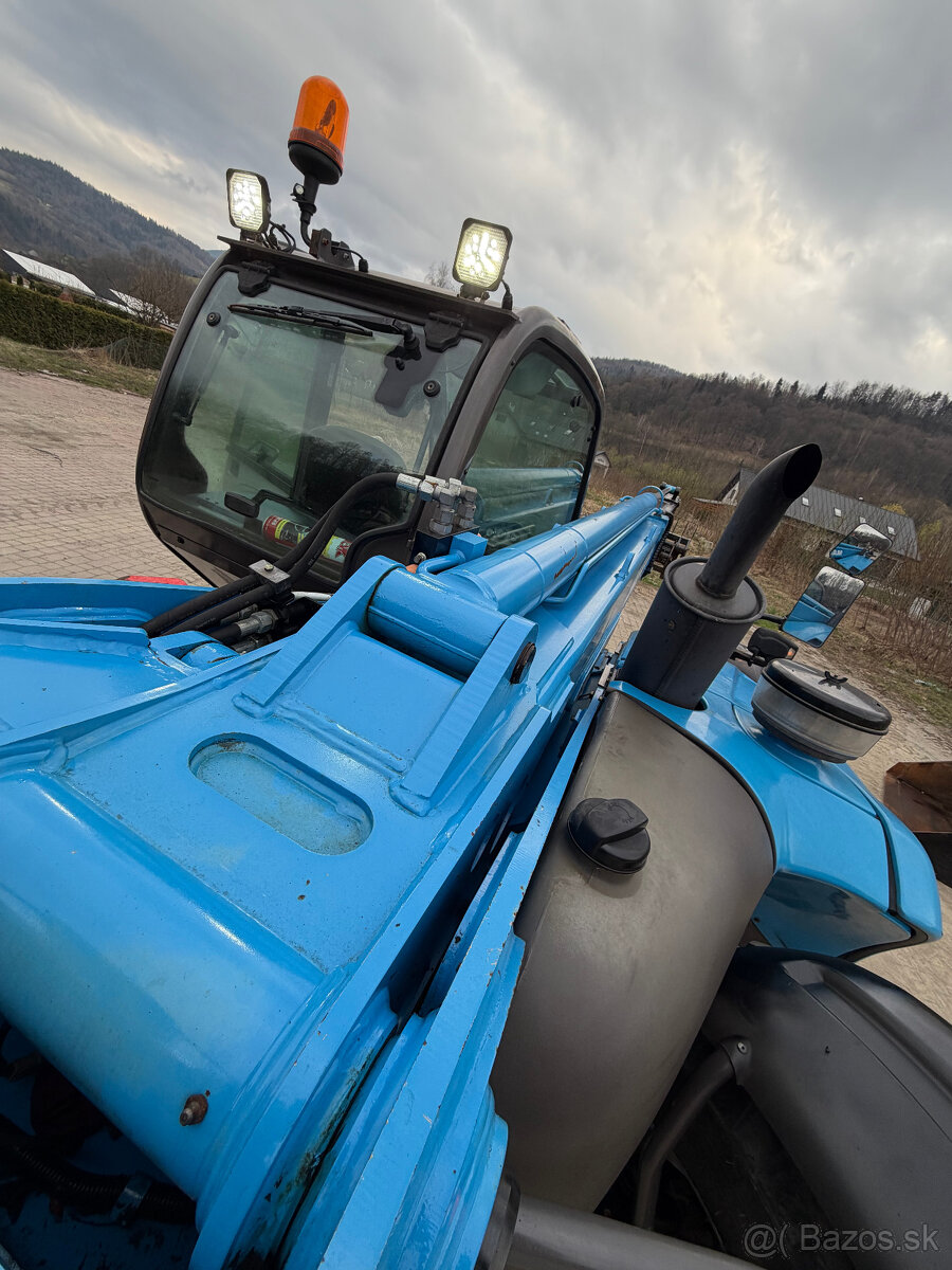 Teleskopický manipulátor Manitou MT932 (dosah 9 m). Nosnosť - 19
