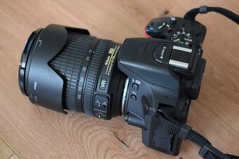 Nikon D5600 - wifi BT - dotyk. displej AF VR objektiv 18-105 - 19