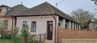 Znížená cena - Predaj vidieckeho domu s veľkým pozemkom v
