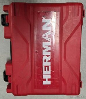 Herman nabijacka s kufrom