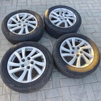 16" alu MAZDA + letné pneu originál.