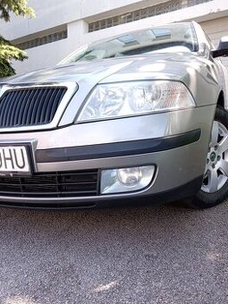 PREDÁM ŠKODA OCTAVIA COMBI1,6 BENZIN r11/2011 KÚP. NA SLOV .