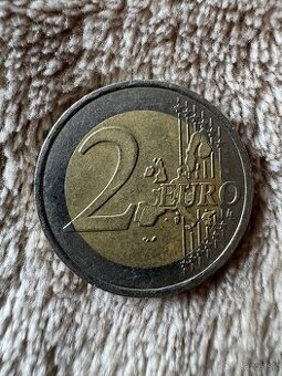 2€ - 1