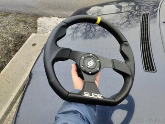 Športový volant SLIDE s redukciou Felicia