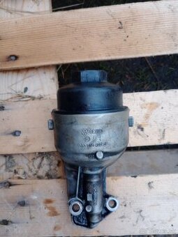 Obal olejového filtra  + nádržka do ostrekovačov