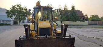 Traktorbager New Holland B110B
