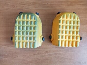 {53}  Chrániče kolien