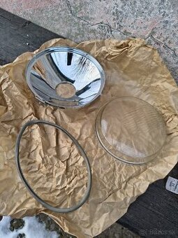 Uloženka nepoužité sklo predného svetla Jawa cz