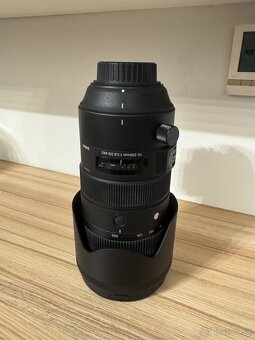 Objektivy Nikkor a Sigma