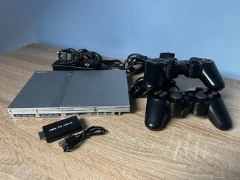 PlayStation 2 Slim Silver + 2 Ovládače a 4 Hry