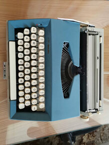 Písací stroj.