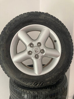 Hliníkové disky NISSAN a pneu NOKIAN 215/65 R16