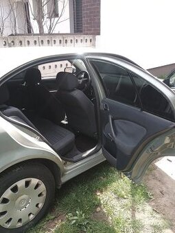 Octavia 1.6 benz 75kw