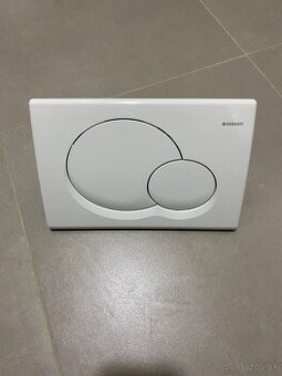 Ovladacie tlacidlo Geberit pouzivane