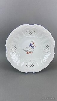 Misa s husou prerezávaná s modrou linkou