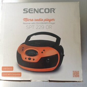 Rádio/CD Sencor.