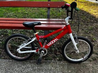 červený  bicykel woom 3