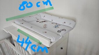 Prebalovaci pult na komodu s podlozkou