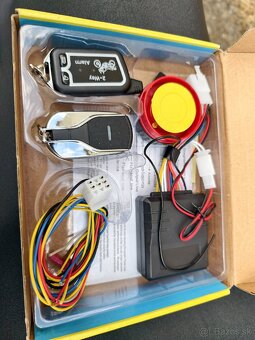 Predam dvojcestny moto alarm