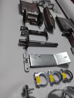 DIELY,SÚČIASTKY JAWA PIONIER 50 - OBJIMKA VÝFUKU STUPAČKY HT