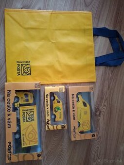 Poštové dodávky, kamión a taška