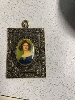 Zarámovany prívesok