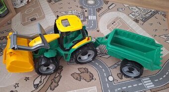 Traktor s lyžicou a vlečkou