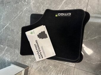 Nove original latkove koberce/rohozky e-Citigo
