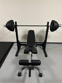 Stojan s olympíjskou činkou a nastaviteľnou lavičkou