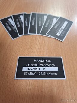 Manet korado - štítok