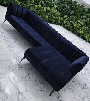 Tmavomodra zamatova rohova sedacka