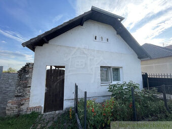 Domček s veľkolepým pozemkom neďaleko Nových Zámkov, o obc