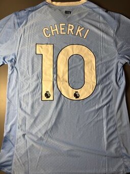 Dres Manchester city Cherki
