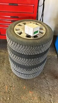 4 ks plechové disky + 4 zimné pneu