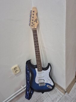 Predam novú elektrickú gitaru