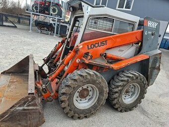 Predam Smykovy nakladac Unc Locust 1203