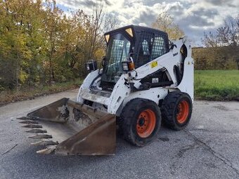Šmykom riadený nakladač Bobcat S185. ŠPZ.