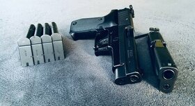 SigSauer p220 .45ACP + 9mm Luger