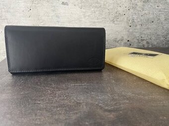 Elegantná dámska kožená peňaženka, čierna úplne nová.
